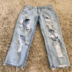 Super cute very distressed girlfriend fit jeans